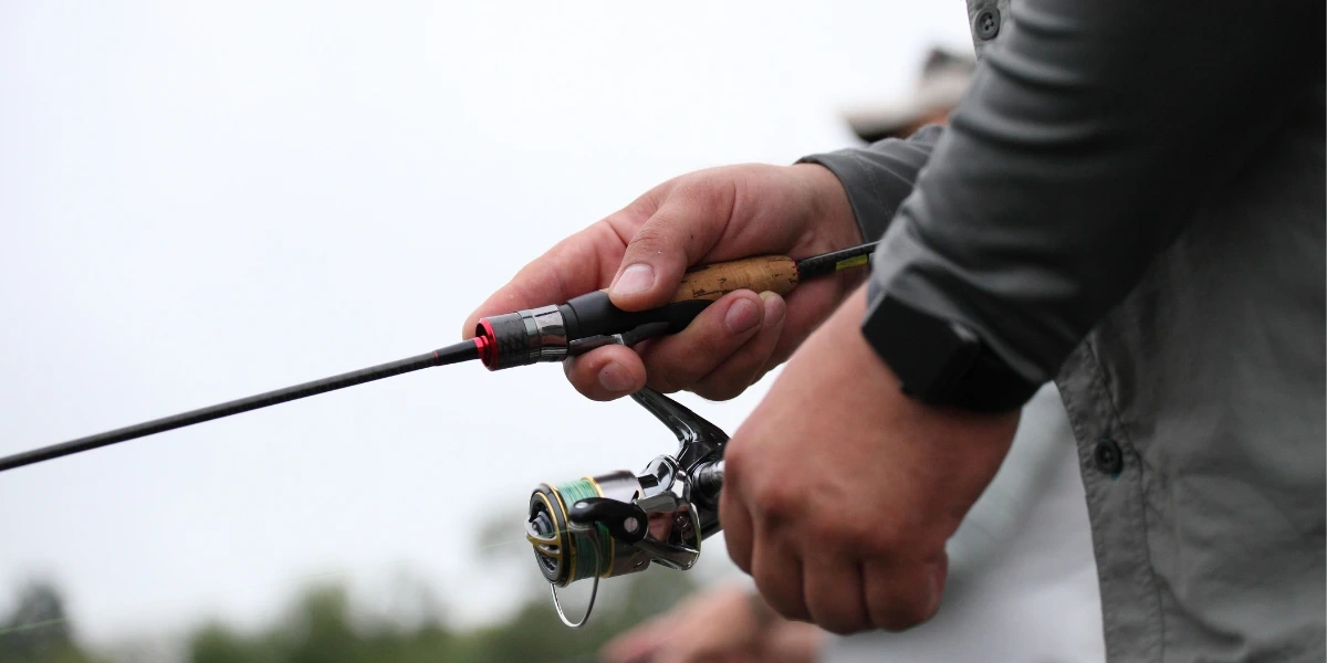 Fisherman holding a fishing line