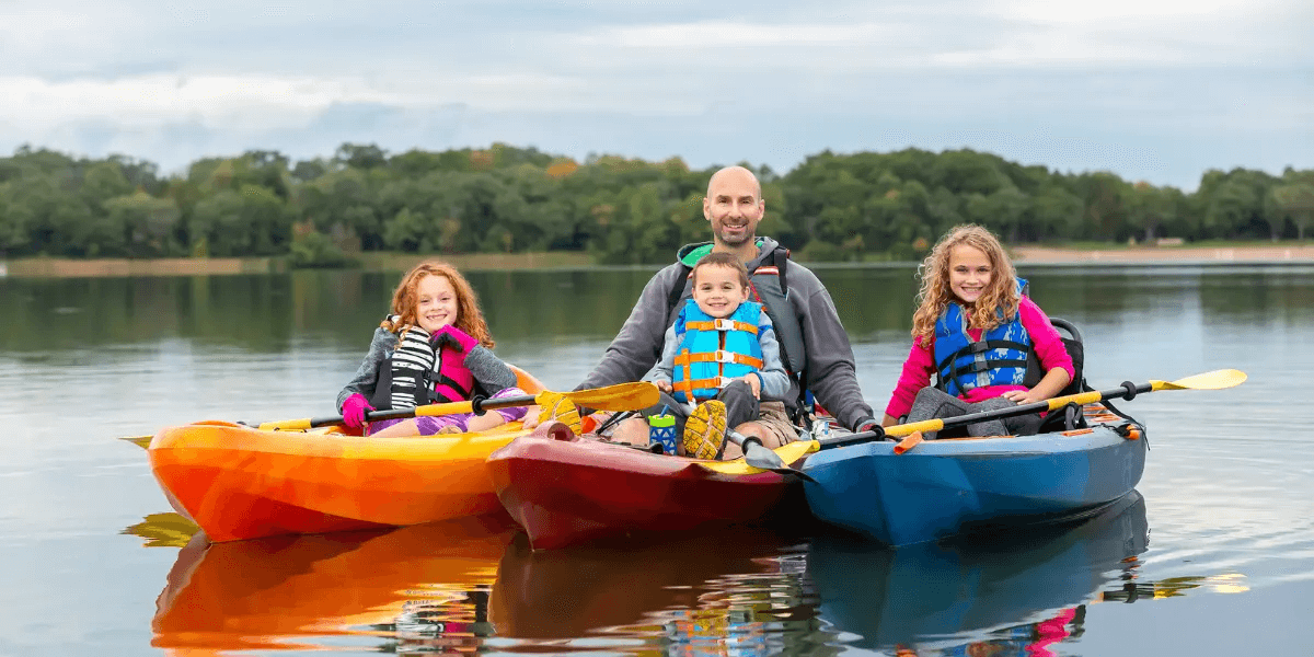 Family on kayaks