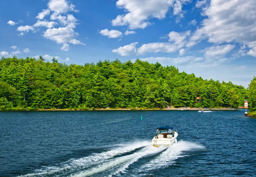 An image of a boat sailing on a lake