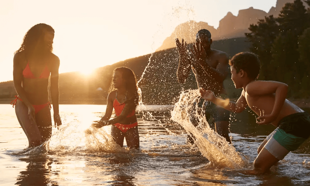 A family enjoying a swim at the lake