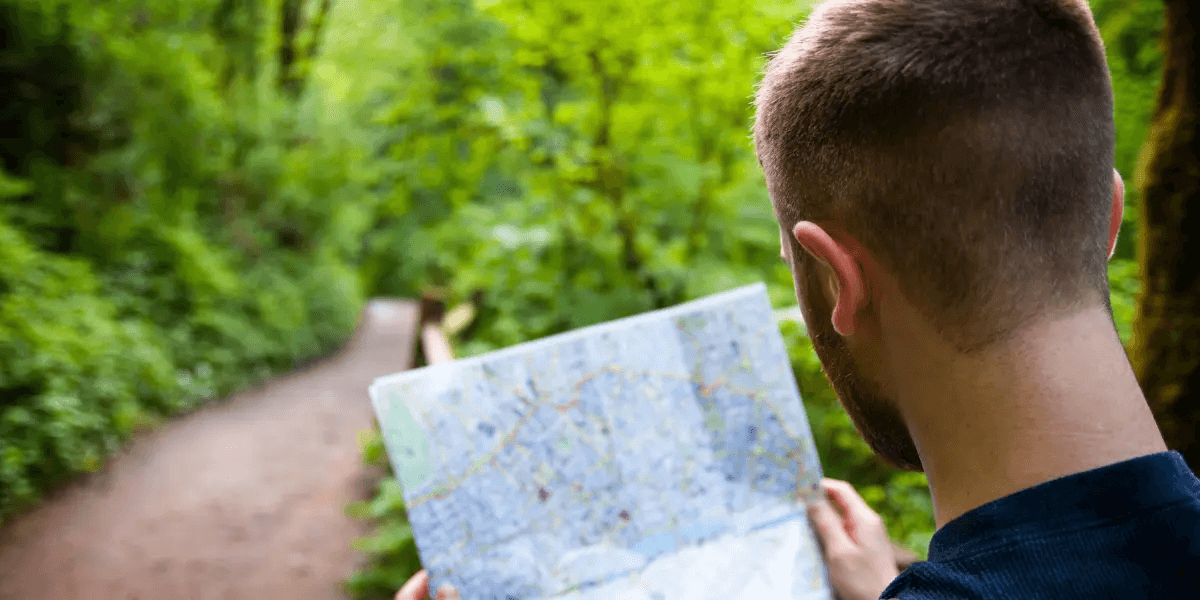 Man looking at a map for directions